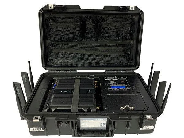 Open black portable case holding a router with multiple antennas